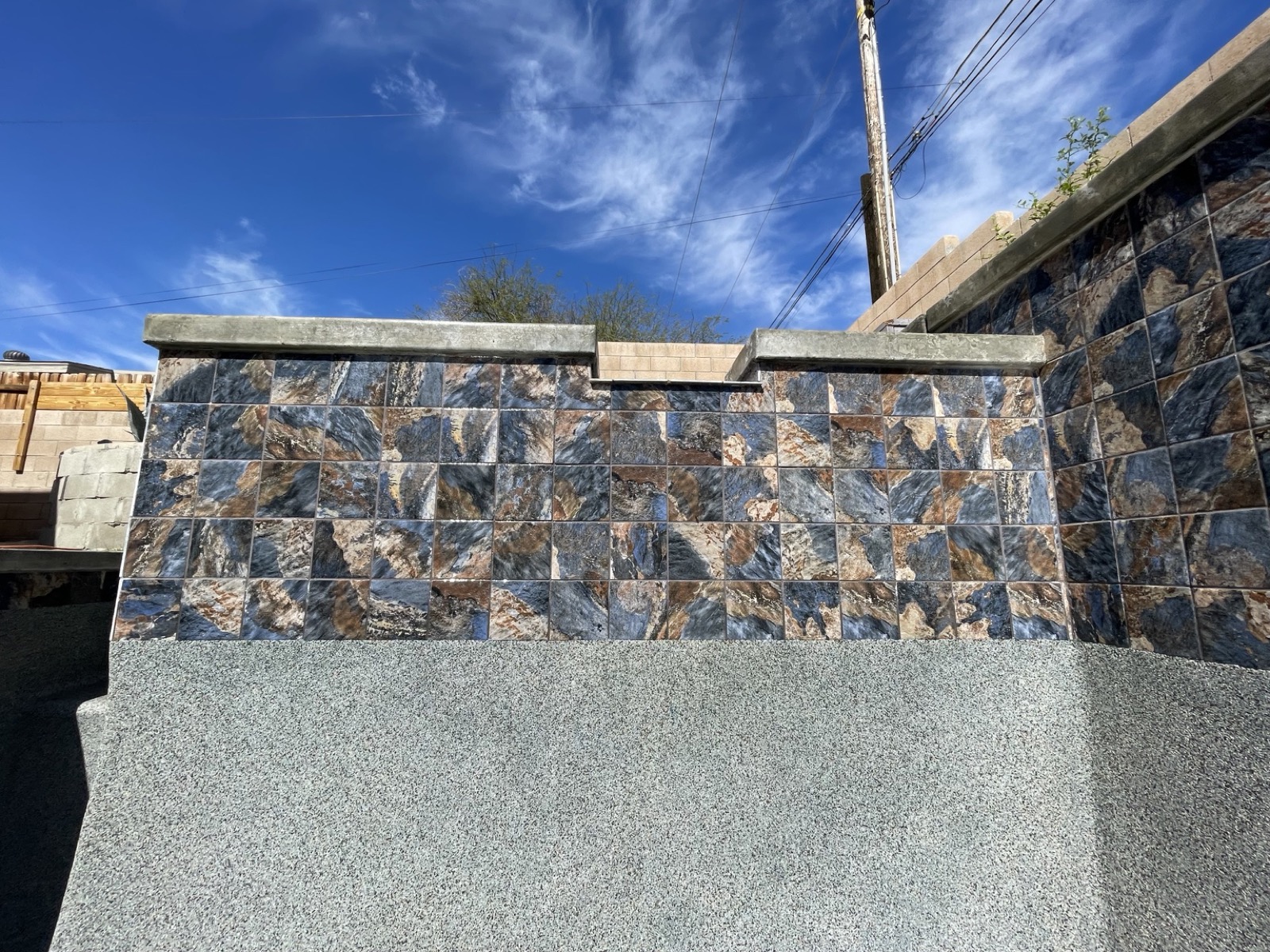 The same waterline tile after the scale was removed